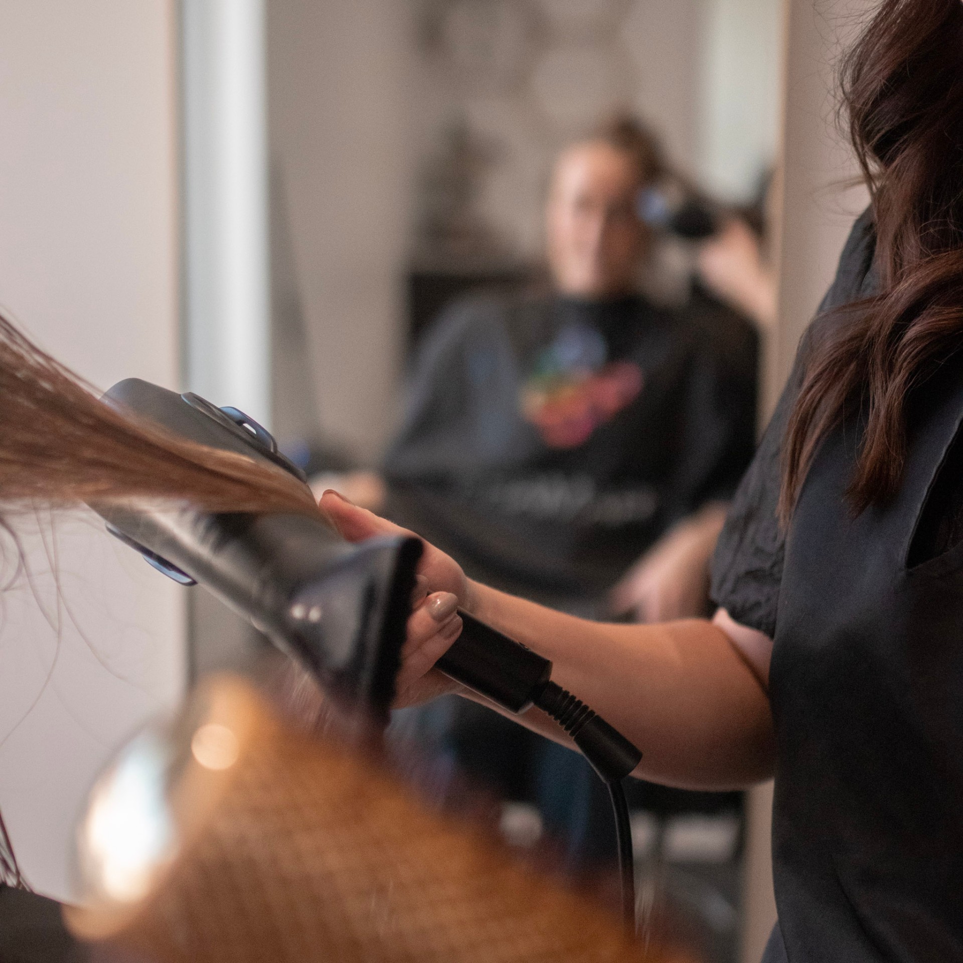 Blow-drying and styling at Restyle Salon